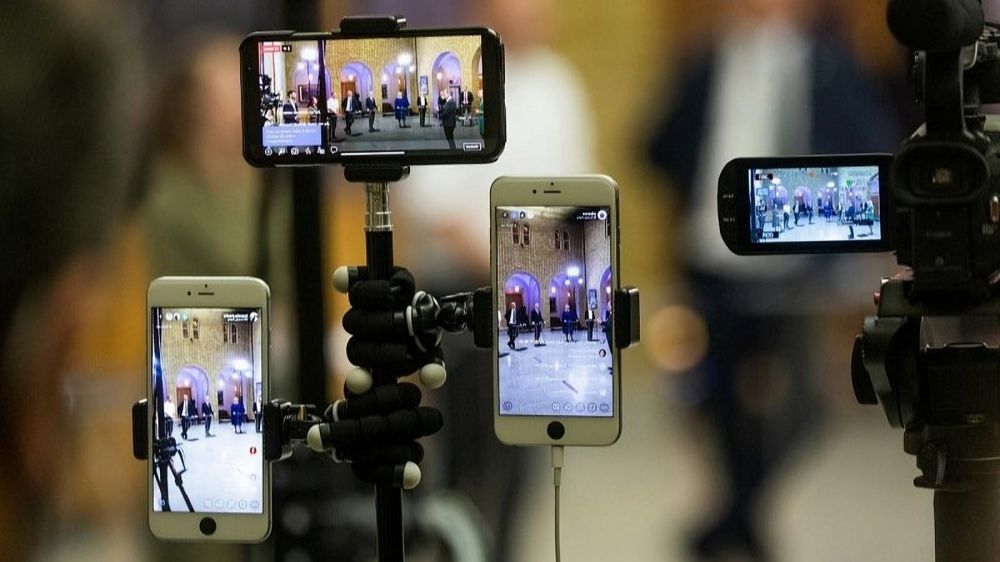 Multi-camera livestream production with multiple camera feeds and live switching